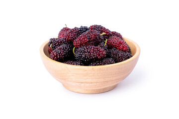 Fresh mulberry fruit in wooden bowl isolated on white background with clipping path. 