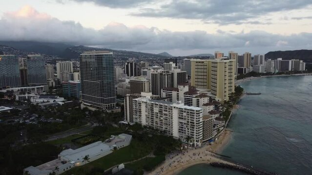 4K cinematic drone shot of Waikiki with Diamond Head in the Oahu background during sunset. This gorgeous Hawaiian cityscape was filmed with a DJI Mini 2 drone.