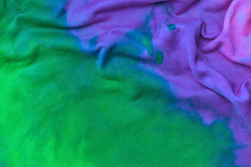 Abstract tie dye neon multicolor folded fabric cloth boho pattern texture for background, sale...