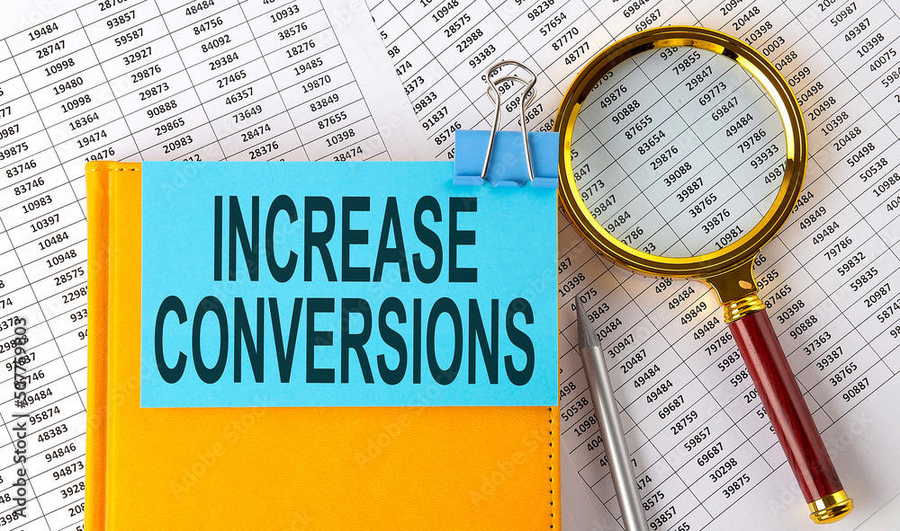 Poster increase conversions text on sticker on notebook with magnifier and chart. business concept