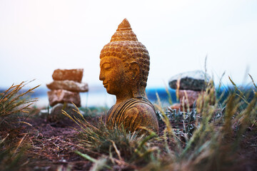 Buddha statue at sunset.