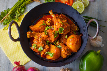Delicious spicy chicken curry in Bengali style is ready to serve. 