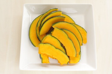 Sliced Japanese pumpkin for autumn cooking image