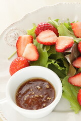 Freshness Japanese strawberry and baby leaves salad with sesame dressing