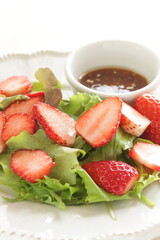 Freshness Japanese strawberry and baby leaves salad with sesame dressing