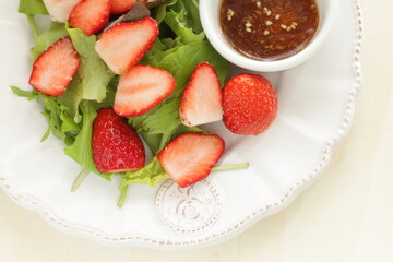 Freshness Japanese strawberry and baby leaves salad with sesame dressing