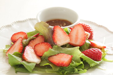 Freshness Japanese strawberry and baby leaves salad with sesame dressing