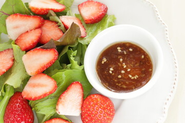 Freshness Japanese strawberry and baby leaves salad with sesame dressing