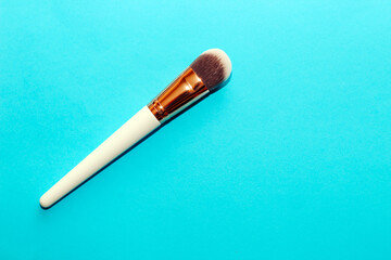Cosmetic brush for applying foundation or concealer.
