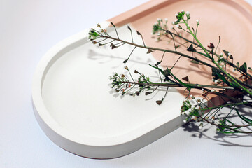 Botanical background with decorative marble plaster stand, space for text.