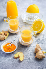 Close up of healthy Ginger Lemon Turmeric Shot ? ideal to boost the immune system