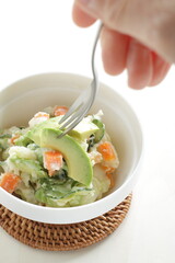 Avocado and carrot mixed mayonnaise salad  with copy space