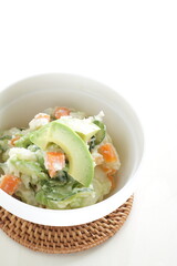 Avocado and carrot mixed mayonnaise salad  with copy space