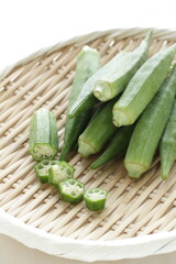 chopped Okra on bamboo basket with copy space