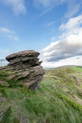 View of the rural landscape of The Roaches and Hen Cloud from Hanging Stone in the Peak District.