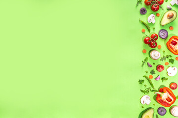 Various fresh vegetables pattern. Raw organic vegetables, salad ingredients bright flatlay on light green background. Healthy diet common diet, vegan vegetarian foodcooking background copy space