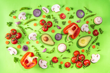 Various fresh vegetables pattern. Raw organic vegetables, salad ingredients bright flatlay on light green background. Healthy diet common diet, vegan vegetarian foodcooking background copy space