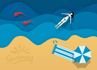 Woman swims on beach. Girl on vacation on beach.