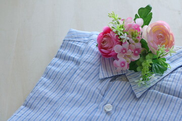 blue shirt and flower for gift image