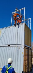 Delegates do practical exercises during a training session on working at height