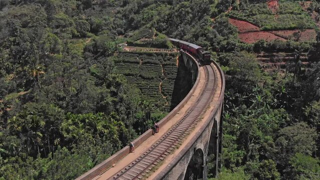 Train passing on Nine Arch Bridge in Sri Lanka