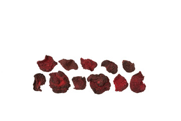 Dried beet slices. Dehydrated vegetables, dried beetroot chips isolated on white background....