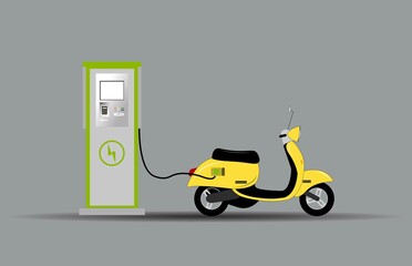 An electric scooter at a charging station recharges batteries. © AliaksaB