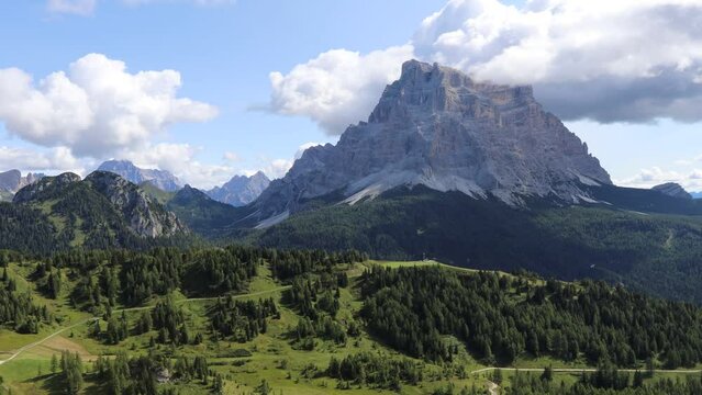 Amazing alpine scenery at Col dei Baldi on Civetta Mountain with Monte Pelmo on background. Alps, Dolomites, Alleghe, Belluno, Italy