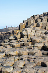 closeup of the stones of the giant's causeway in ireland worn from the traffic of tourists