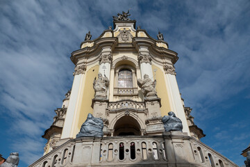 Fototapeta na wymiar Lviv, Ukraine. Statues on the entrance St. George's Cathedral protected in case of missile strike.