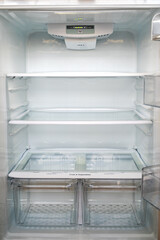 New white refrigerator inside view.