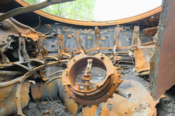 Inside of smashed and burned russian tanks. Burned tank. War in Ukraine.