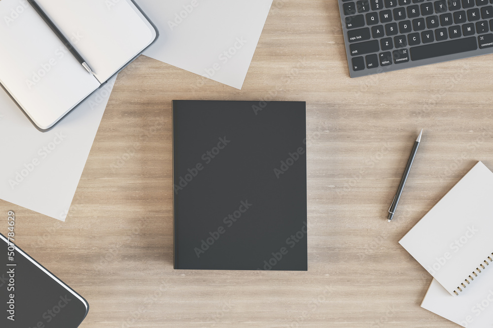 Aufkleber Top view of empty black notebook on wooden desktop with supplies. Work, diary, homework and workplace concept. Mock up, 3D Rendering.