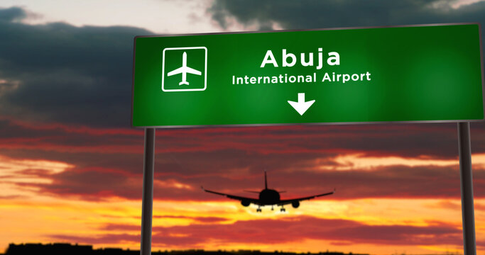 Plane Landing In Abuja Nigeria Airport With Signboard