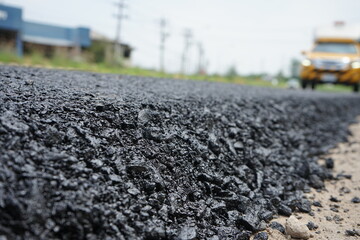 The blur of the asphalt road
