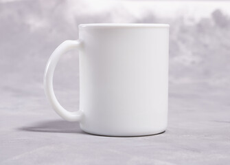 Obraz premium white mug on a gray background