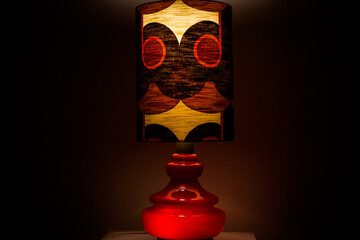  A 60s modern red bedside lamp with glass base and fabric lampshade vintage midcentury design front...