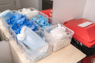 personal protective equipment PPE: hairnet, surgical mask and blue shoe covers