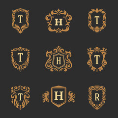 Luxury monogram logos templates vector objects set for logotype or badge design. Trendy vintage royal ornament frames illustration, good for fashion boutique, alcohol or hotel brand.