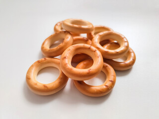 Heap from sushki isolated on white background. Russian or Ukrainian traditional food of sweet wheat dough.