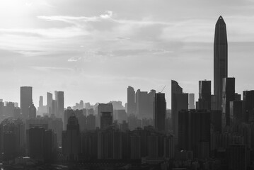 Silhouette of skyline of Shenzhen city, China under sunset. Viewed from Hong Kong border - 507795868