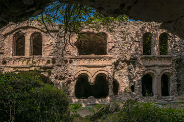 Brick ruins and ruined rooms of old fortification fort outpost. Popular monument of military history and travel destination, Tarakaniv, Ukraine
