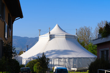 White circus tent at City of Jona on a sunny spring day. Photo taken April 28th, 2022,...