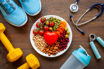 Healthy diet eating concept. Less fat more omega 3 food in plate with heart object