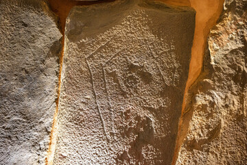 Artistic manifestation engraved in the stone in the megalithic monument of El dolmen de Soto