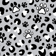 Leopard print with paw of dogs and cats. Cat paw pattern. Camouflage leopard vector seamless pattern on gray background. Leopard skin texture. 