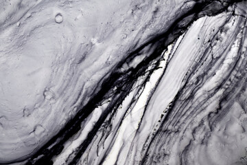 Black and white ink abstract background, marble texture, fluid art pattern wallpaper, paint mix underwater wavy spots and stains