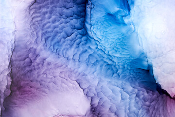 Purple blue ink abstract background, marble texture, fluid art pattern wallpaper, paint mix underwater wavy spots and stains