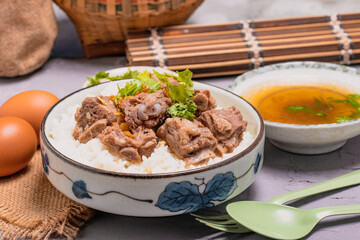 Dried Rice Porridge with Boiled Pork Bones and Broth