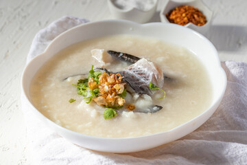 Fish porridge in a white bowl